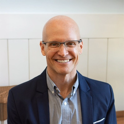 A headshot of Dr. Eric Cram a chiropractor at Cram Chiropractic & Wellness Center